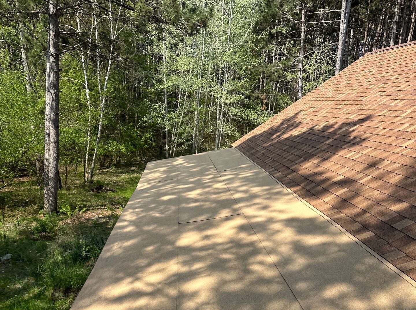 "Flat roof maintenance and repair on a commercial property"