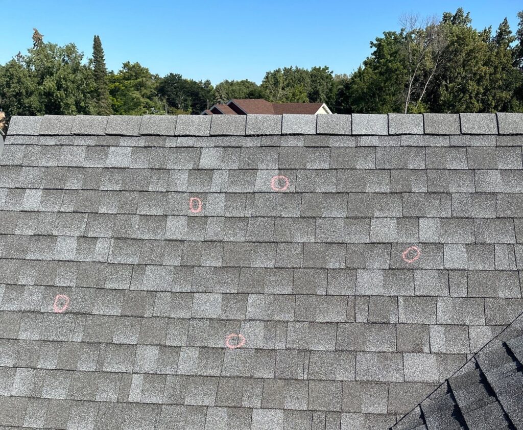 "Roof and siding storm damage restoration by BJT Roofing experts"